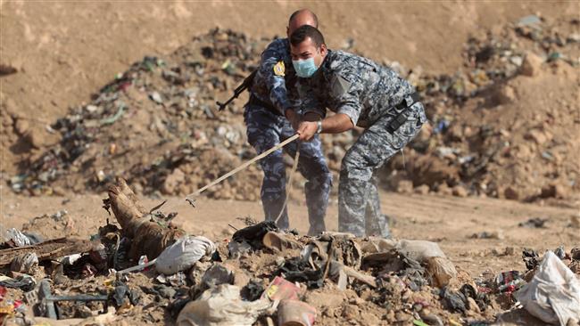 Mass graves containing tens of civilians found in western Mosul