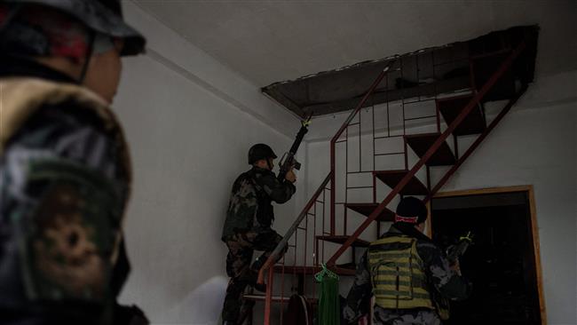 ISIS-linked militants kill 13 Philippine marines in Marawi city 