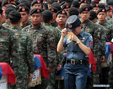 Yari ang isang Pulis sa surveillance operasyon 