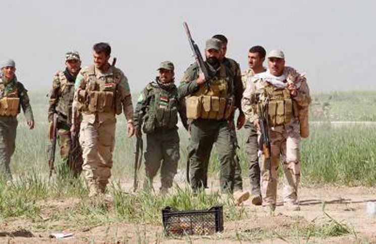 الحشد الشعبي يلقي القبض على قيادي داعشي متنكر بزي النساء في صلاح الدين+(صورة)