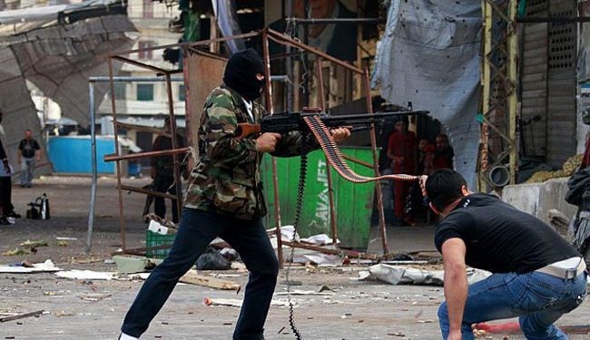 اشتباكات ضارية تندلع بين فصائل مسلحة متنافسة شرقي طرابلس