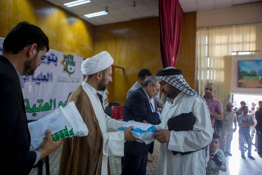 تقرير مصور/ العتبة العباسية المقدسة تحتفي بتحرير الموصل عند عوائل شهداء الحشد الشعبي