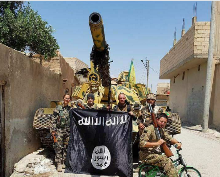 مسلحون أكراد يقتلون 30 من داعش ويسيطرون على مبنى الأمن السياسي بالرقة