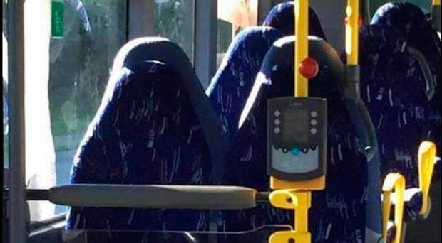 Norwegian fascists mistake empty bus seats for burka-clad women