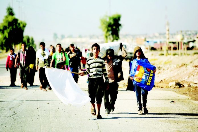 Iraqi refugees stands almost three million