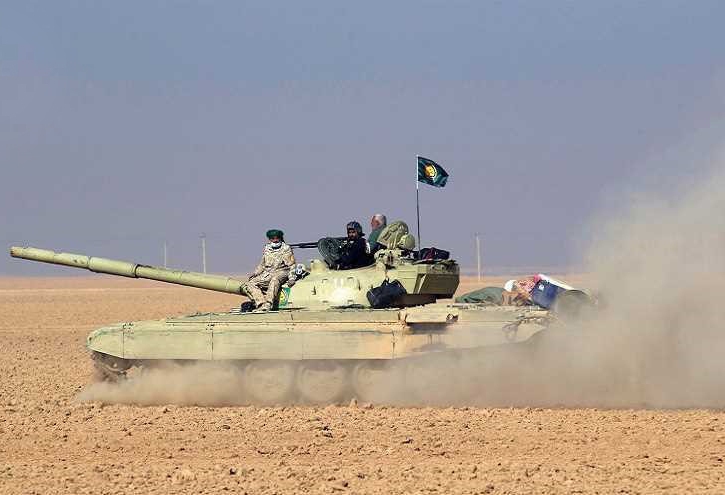 اشتباكات بين الحشد والشرطة مع داعش التكفيري في أول أحياء تلعفر