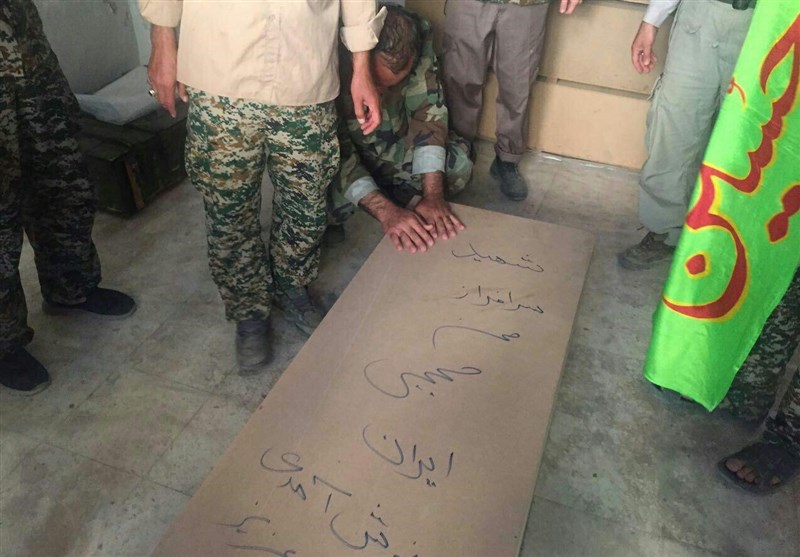 Hezbollah receives body of Iranian martyr Hojaji from ISIS