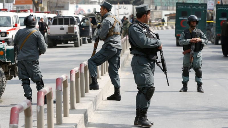 Two Afghan police, 7 militants killed in attacks