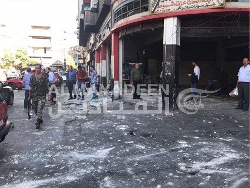 شهيدان وجرحى في عمليات انتحارية ارهابية استهدفت مقر قيادة الشرطة بدمشق+(صور)