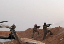 ISIS hält immer noch Taschen in Mosul, gelobt Rache per SMS