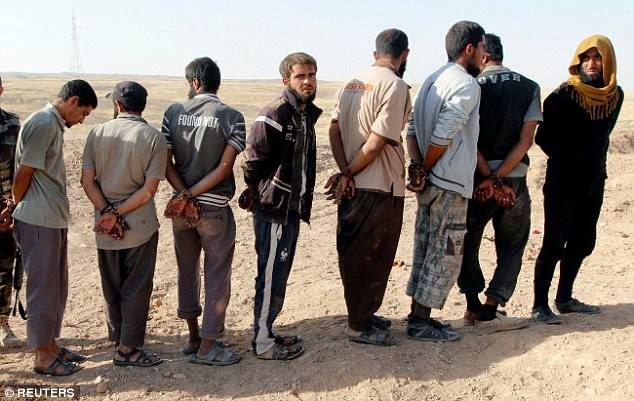 قيادي في الحشد الشعبي يكشف عن تسليم نحو 800 داعشي للبيشمركة