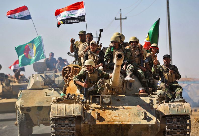 قوات الحشد الشعبي تبعد 13 كم عن مركز قضاء القائم