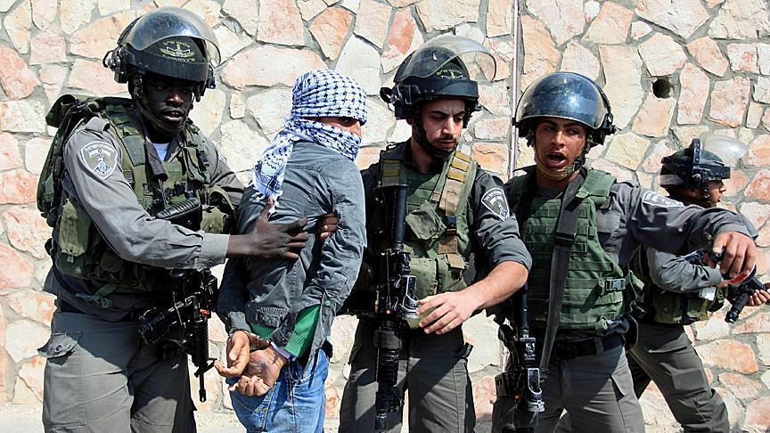 Israeli forces assault, take selfie with wounded Palestinian detainees