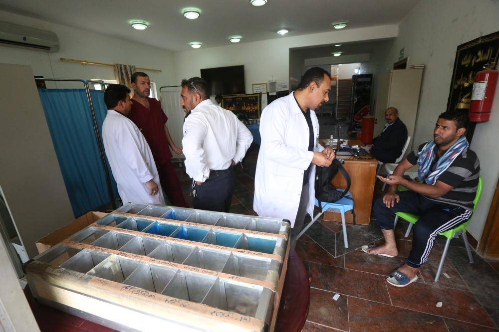 تقرير مصور/ خدمة أبي الفضل العباس في مجمع الكليني يستقبلون زائري الأربعين ويقدمون الخدمات لهم