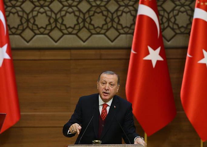 أردوغان يهدد أكراد سوريا