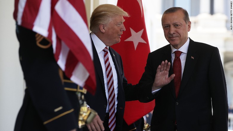 Trump warns Erdogan not to bring U.S. and Turkish forces into conflict 
