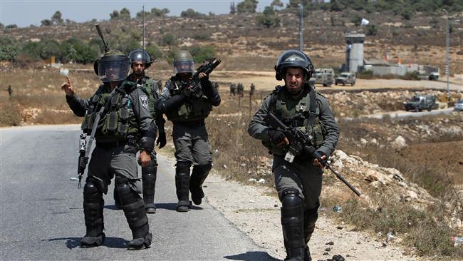 Israeli occupied forces raids Al-Khalil school