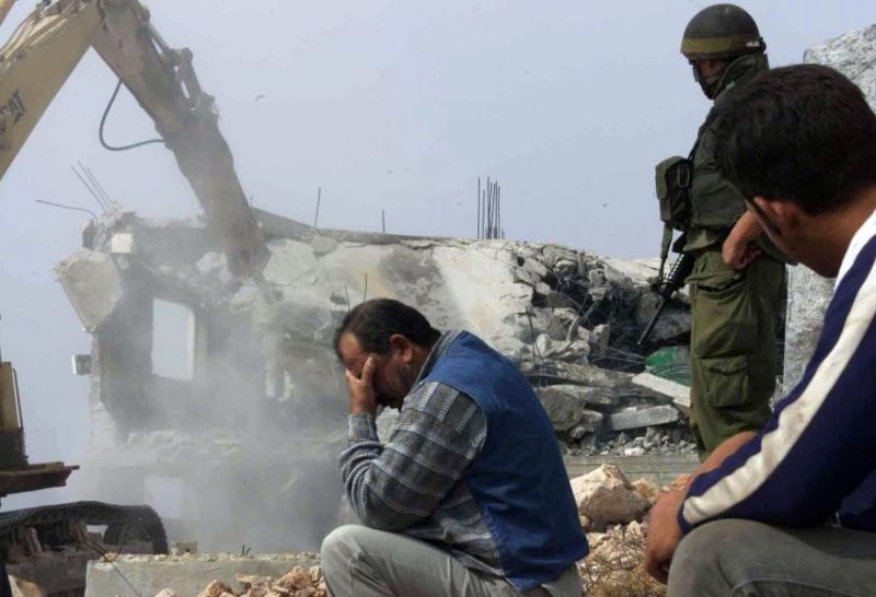 Zionist forces demolish two under-construction Palestinian residential buildings In Beit Jala