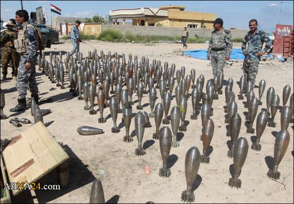 القوات العراقية تضبط 15 حزاما ناسفا وعبوات وقنابر هاون بأيمن الموصل