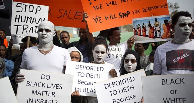 Thousands of African, Israeli migrants protest against Tel Aviv's plans to deport them