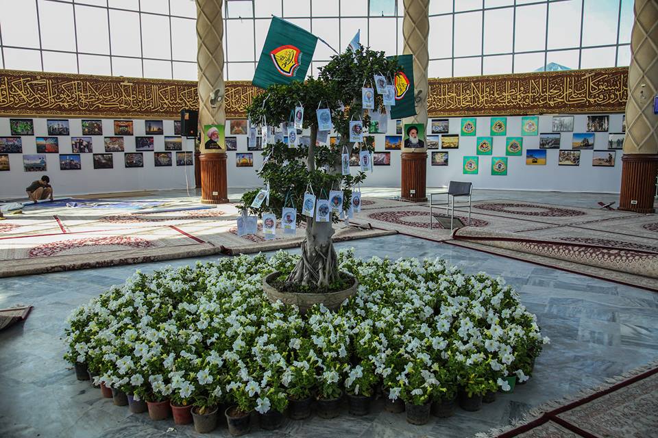 صور شهداء العراق بمهرجان نسيم كربلاء وسط العاصمة الباكستانية اسلام اباد