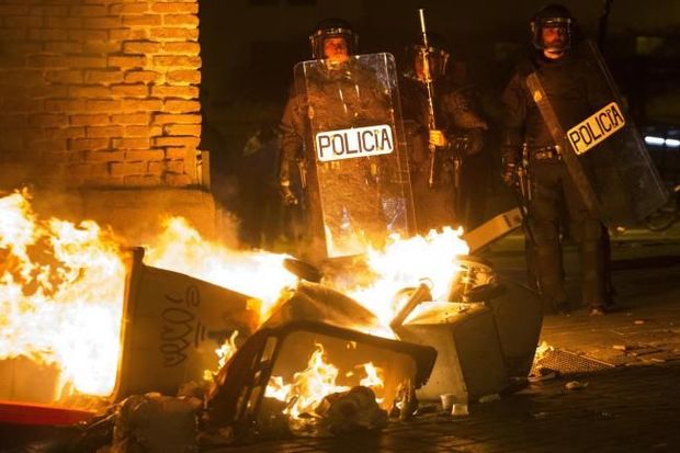 Испанија гарышды, Мадриддә полис-мигрант гаршыдурмасы