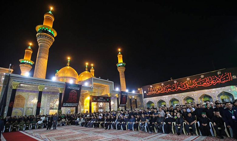 استبدال راية قبتي الامامين الكاظم والجواد (ع) ايذانا ببدء مراسيم احياء الاستشهاد+(صور)