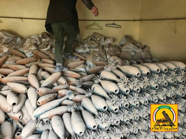 مديرية هندسة الميدان في الحشد تعثر على عدد كبير من "قنابر الهاون ومتفجرات" خلفتها داعش غربي الانبار