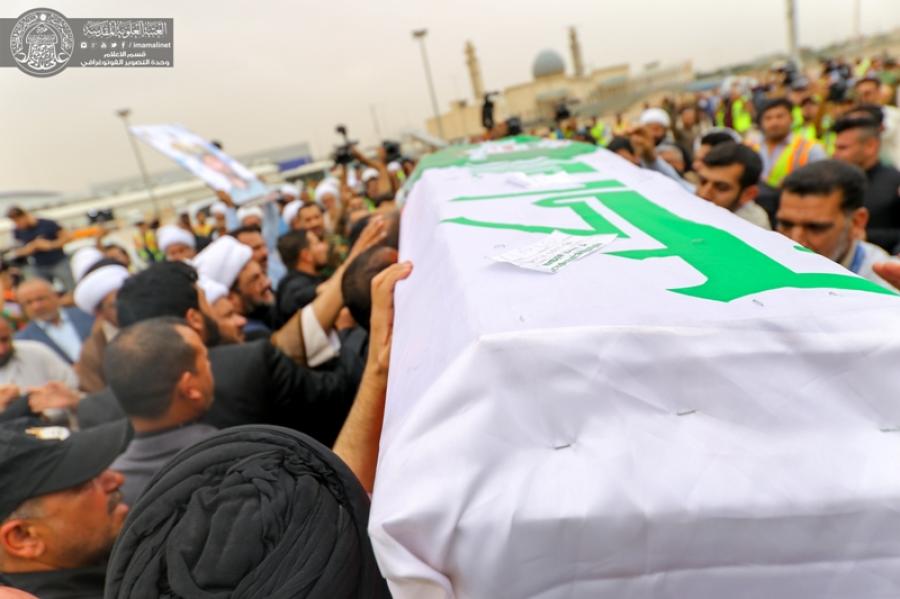 العتبة العلوية المقدسة تشارك في استقبال جثمان فقيدها قائد فرقة الإمام علي(ع)+(صور)
