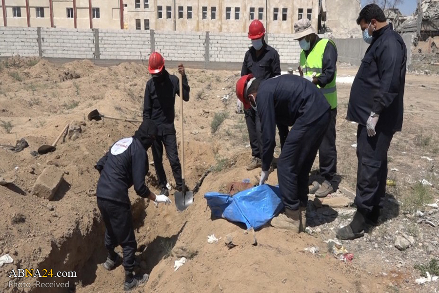 900 bodies exhumed from mass graves in Syria's Raqqa
