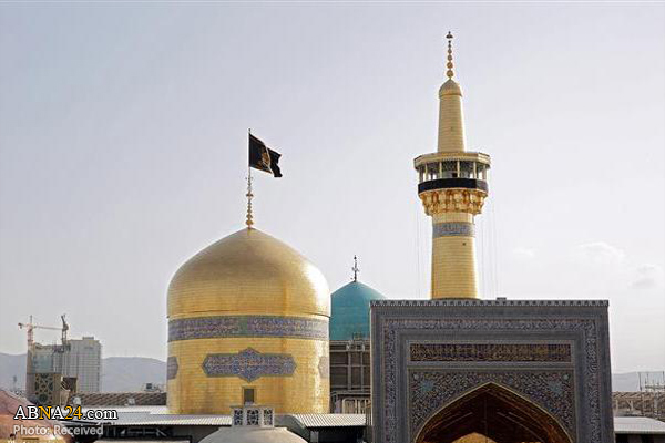 Mourning flag hoisted over sacred dome of Imam Reza Holy Shrine