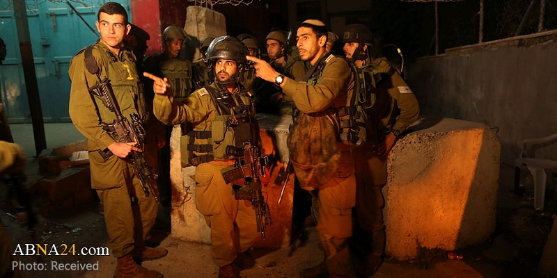 Zionist soldiers abduct a Palestinian young man, two children near Ramallah
