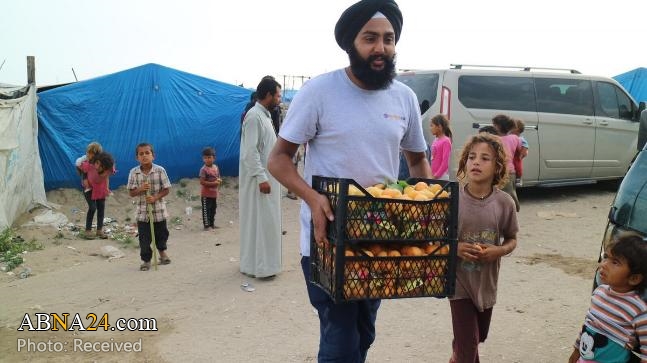 Sikhs in UK serve iftar to 5,000 Syrian Muslims for Ramzan month