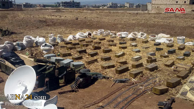 Syrian army find mass weapons, ammo, IEDs left behind by terrorists in al-Houleh