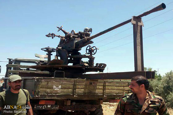 Armed groups in Busra al-Sham continue handing over heavy weapons to Syrian Army