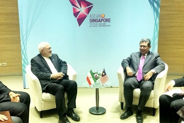 ایران اور ملائشیا کے وزراء خارجہ کی سنگا پور میں ملاقات