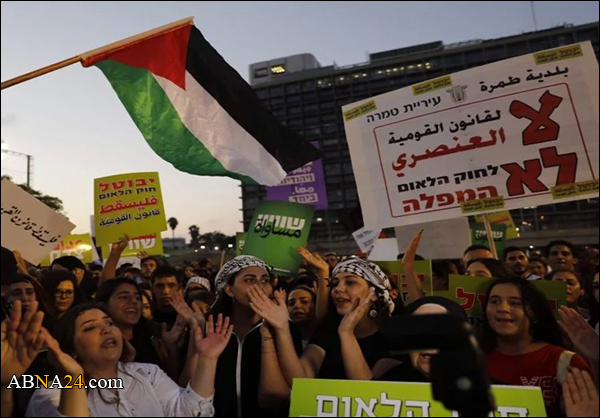الفلسطينيون يرفعون "علم فلسطين" في تل أبيب