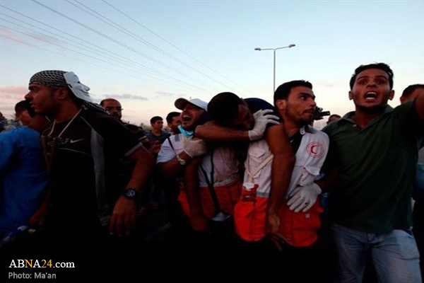 Israeli forces kill 15-year-old Palestinian, injure dozens in Gaza