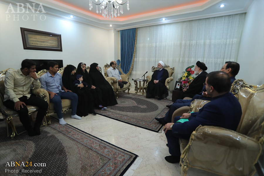 Iran President visits wounded veteran with 70% disability