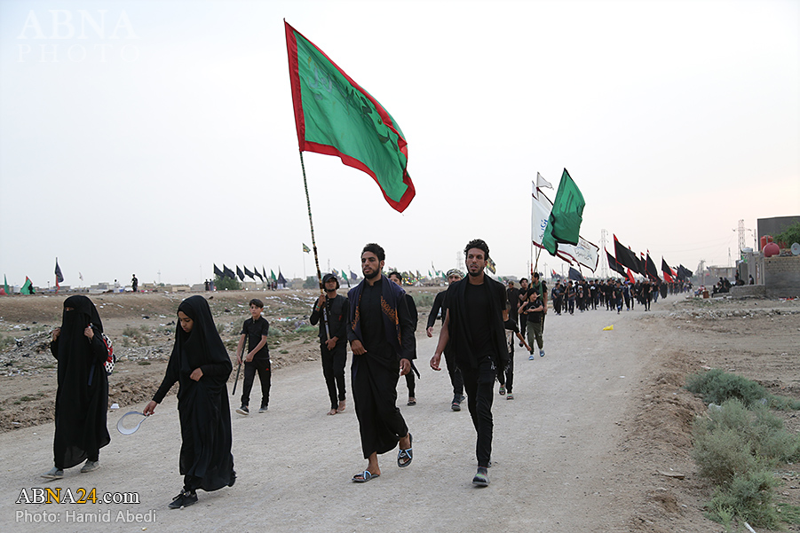 تقرير مصور/ زوار أربعينية الامام الحسين (ع) يواصلون طريقهم الى كربلاء المقدسة