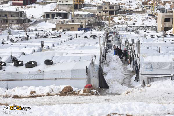 Photos: Rain, snow at Syrian refugee camp