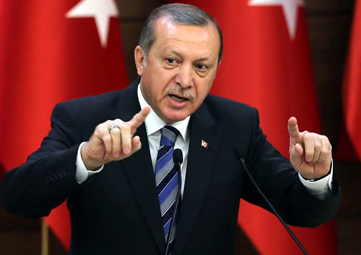 أردوغان: "الوحدات الكردية" سمحت لبقايا داعش بالخروج من الرقة