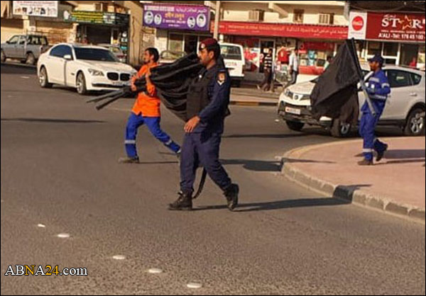 منتسبو الأجهزة الأمنية يعتدون على المظاهر الدينية ويصادرون "الأعلام والسواد"
