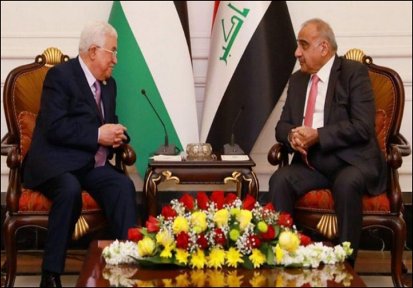 "محمود عباس" من بغداد: أمريكا أثبتت عدم حياديتها في قضية فلسطين