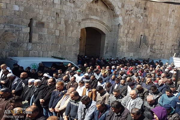 Palestinians banned from Al-Aqsa perform prayers at Lions Gate