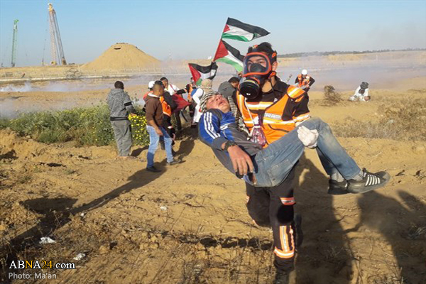 Israeli forces kill 15-year-old Palestinian, injure dozens in Gaza (+Photos)