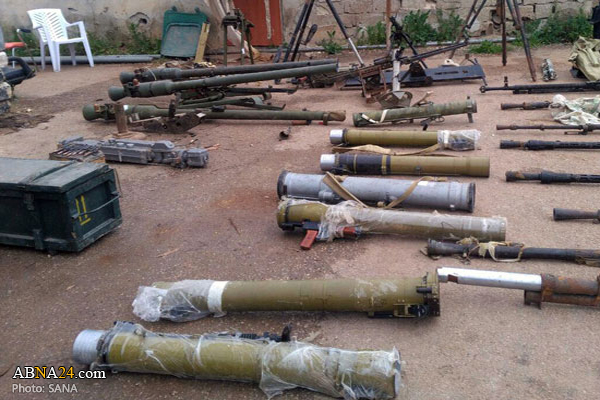 Photos: US, Israeli-made weapons left by terrorists found in Daraa