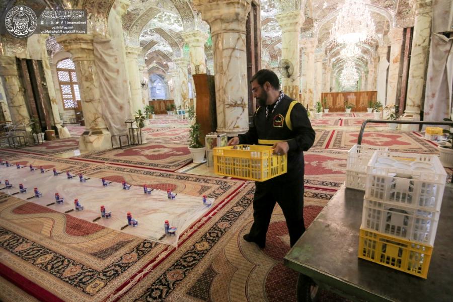 تقریر مصور/ قسم مضيف العتبة العلوية يوزع 10 آلاف وجبة إفطار في رحاب مرقد أمير المؤمنين (ع)
