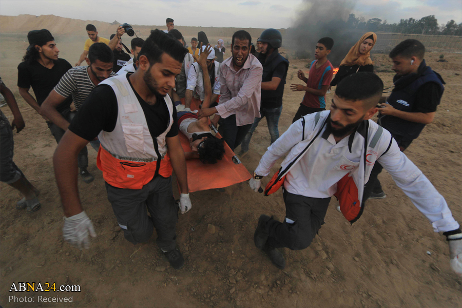 Israeli forces injure nearly 100 Gazan protesters