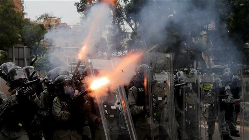 Hong Kong police clash with protesters, fire tear gas